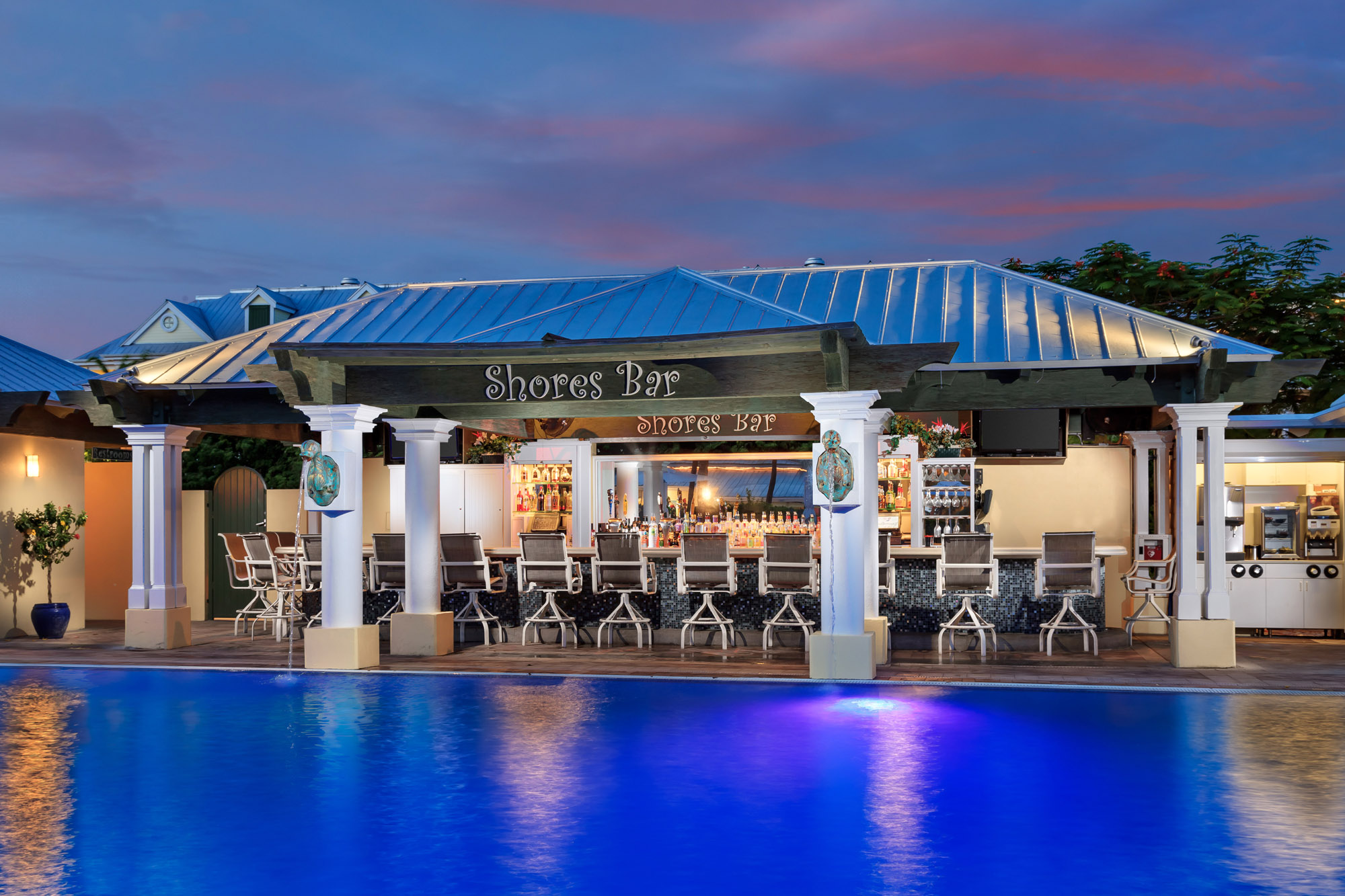 Poolside Shores Bar at dusk.
