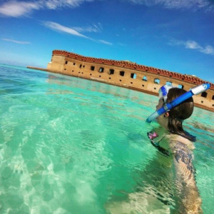 Selfie of young woman snorkeling