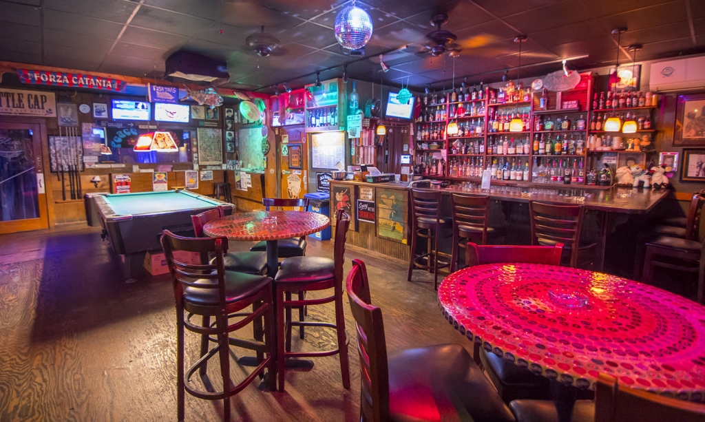 Games room with pool table and beer bottle wall decorations