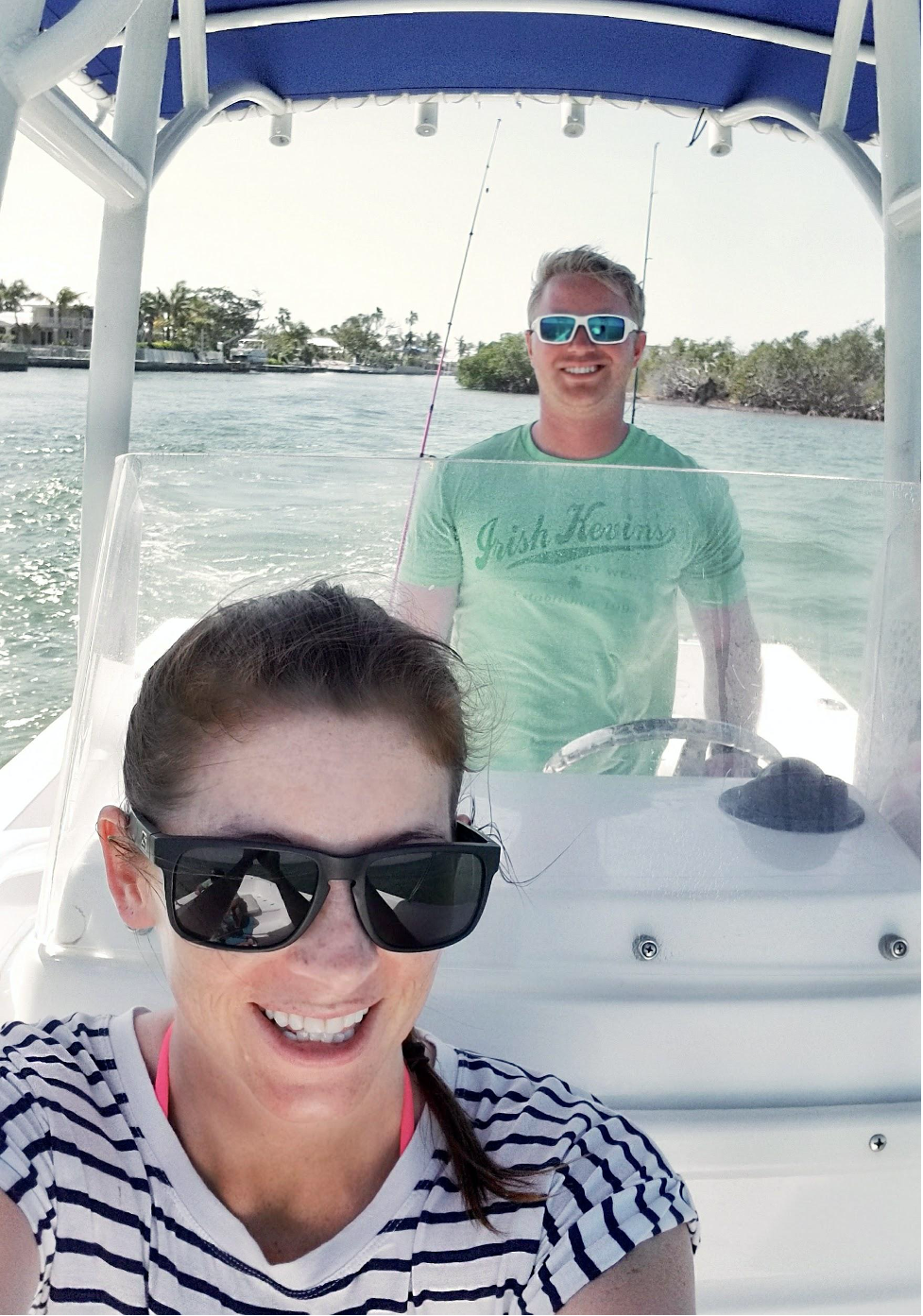 Boat selfie of man and woman.