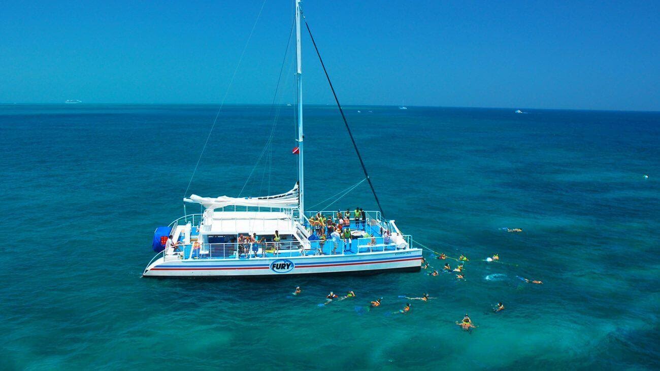 A yacht sailing in clear blue waters