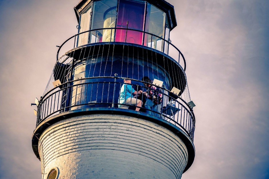 people on a lighthouse