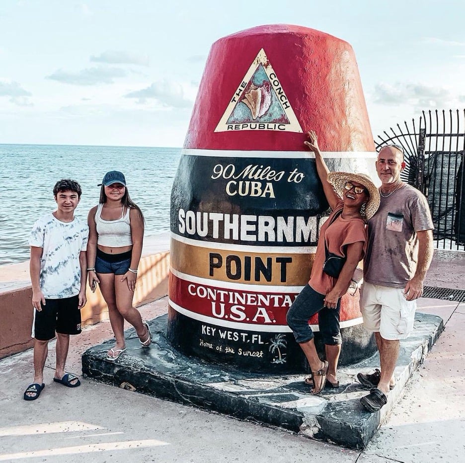 family on vacation by the water