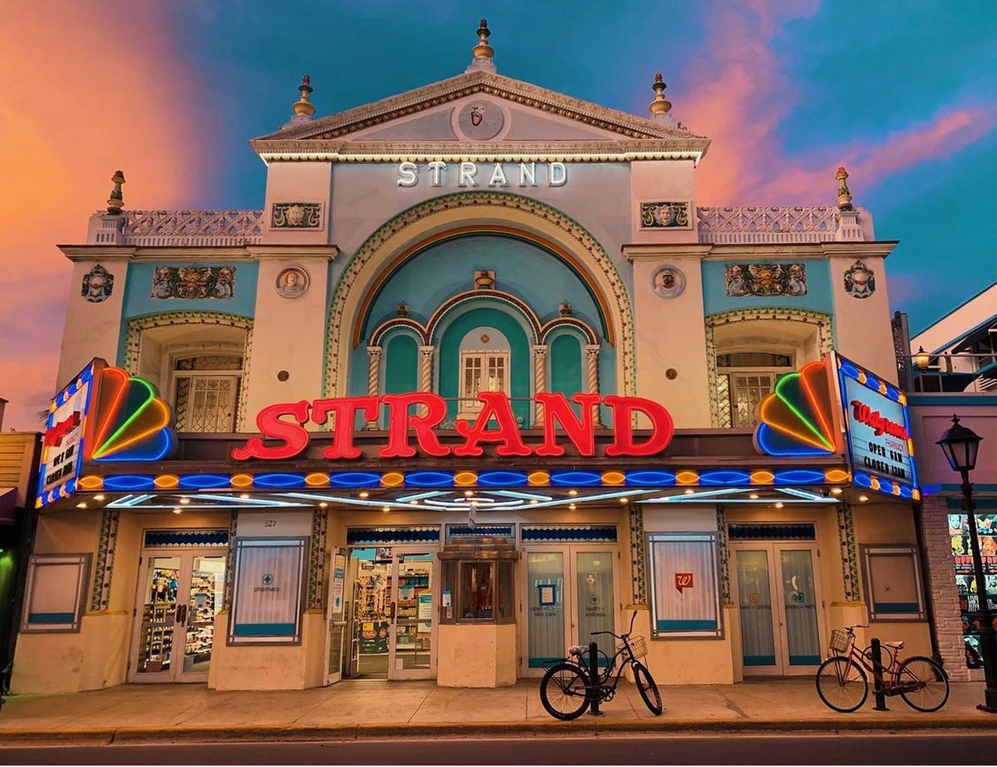 exterior of a building with STRAND signage