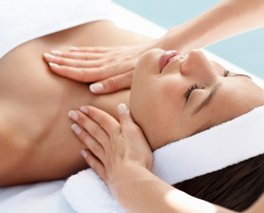 A woman receiving a massage at a spa.