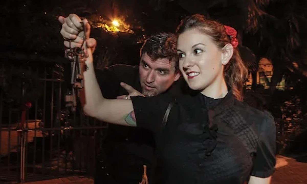 Woman holding old keys to haunted house