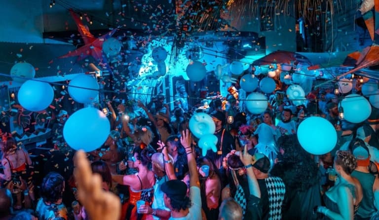 club party with ceiling balloons