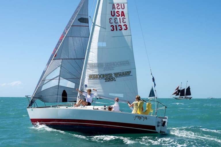 people sailing on the ocean
