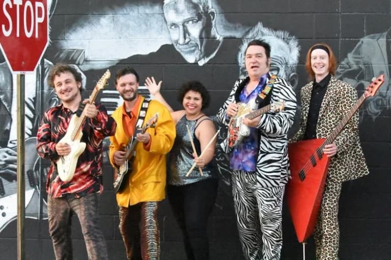 band photo against building