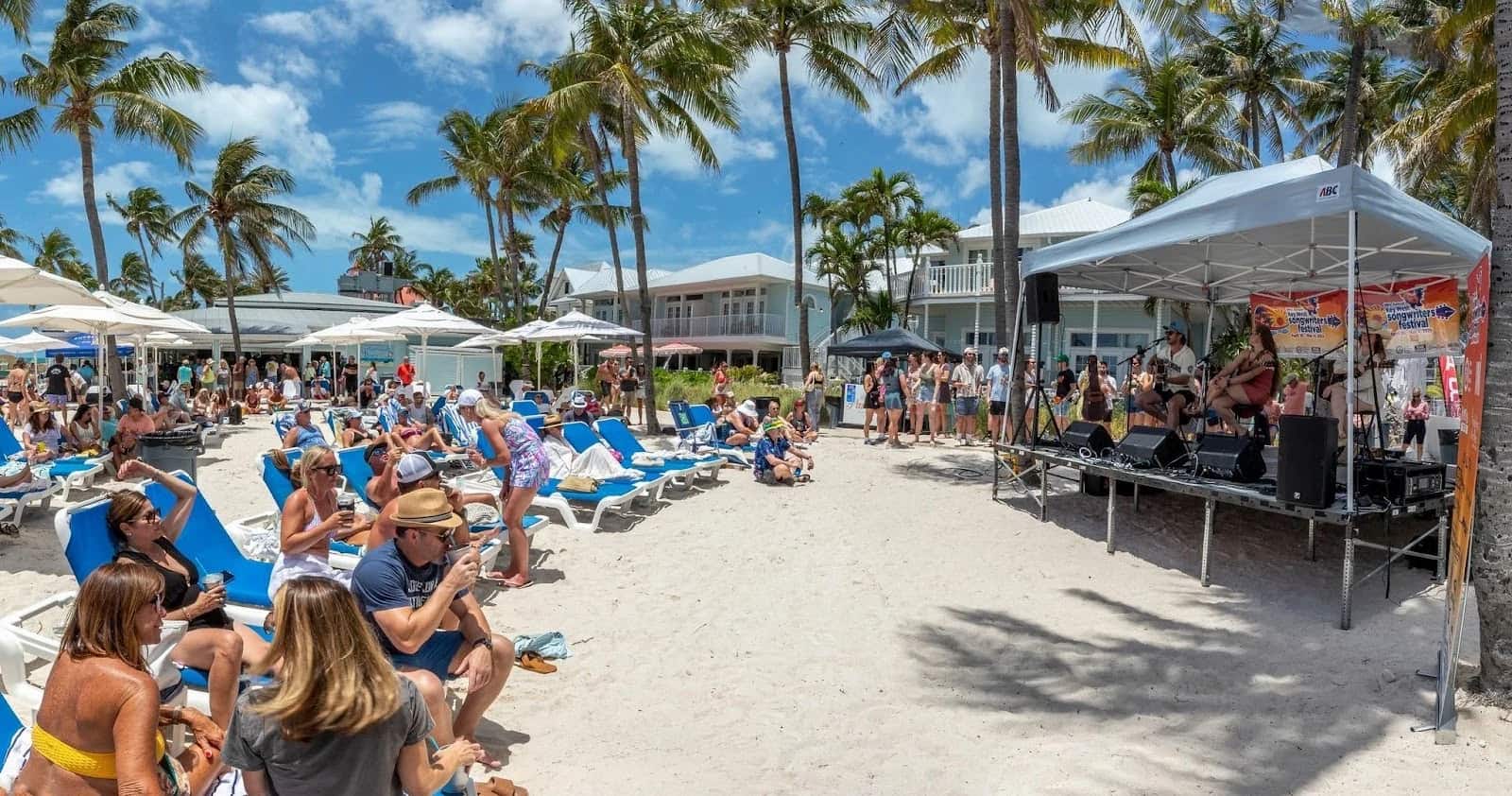 people enjoying a beach concert