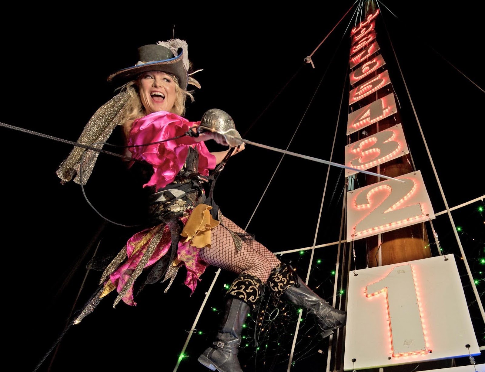 lady pirate swinging from sign
