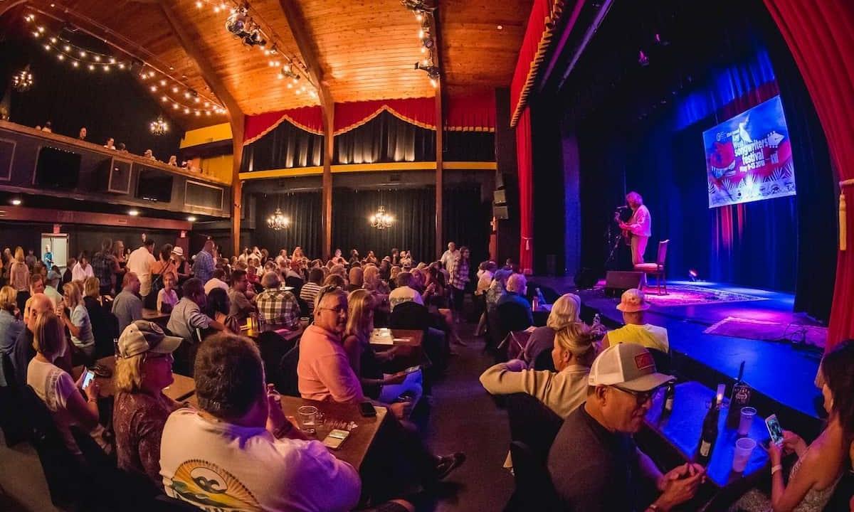 people gathered in a theater