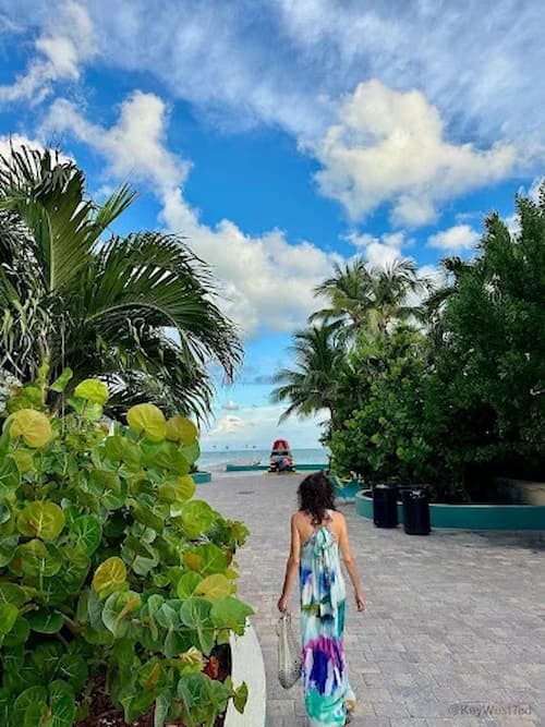 woman walking to buoy marker
