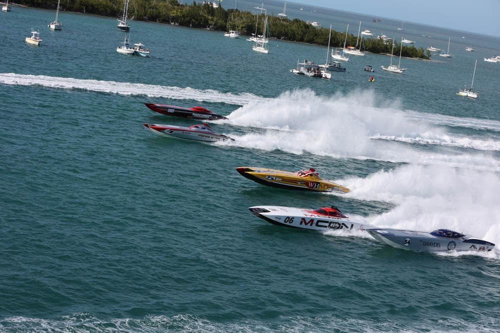 speed boats on water