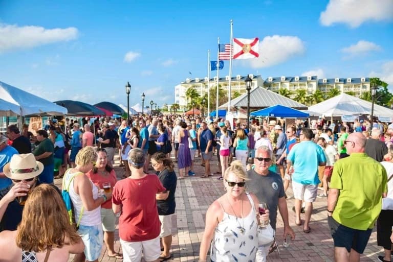 people walking around festival
