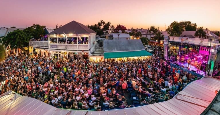 large crowd at festival at sunset