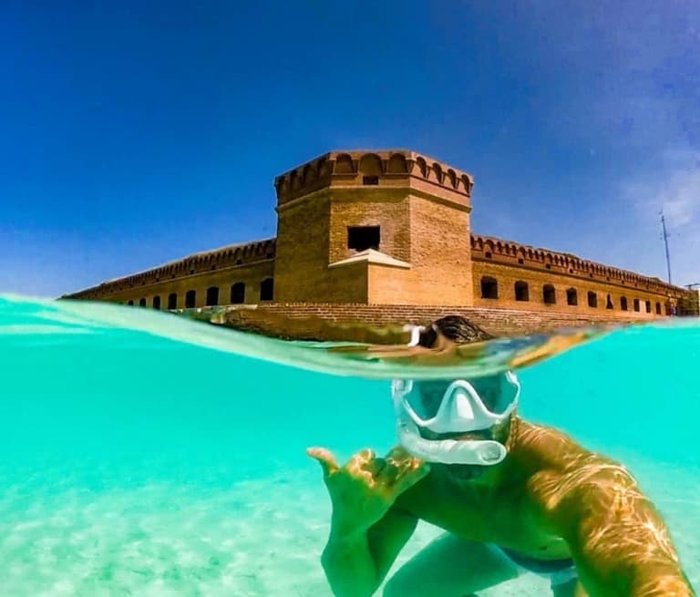 snorkeling around old building