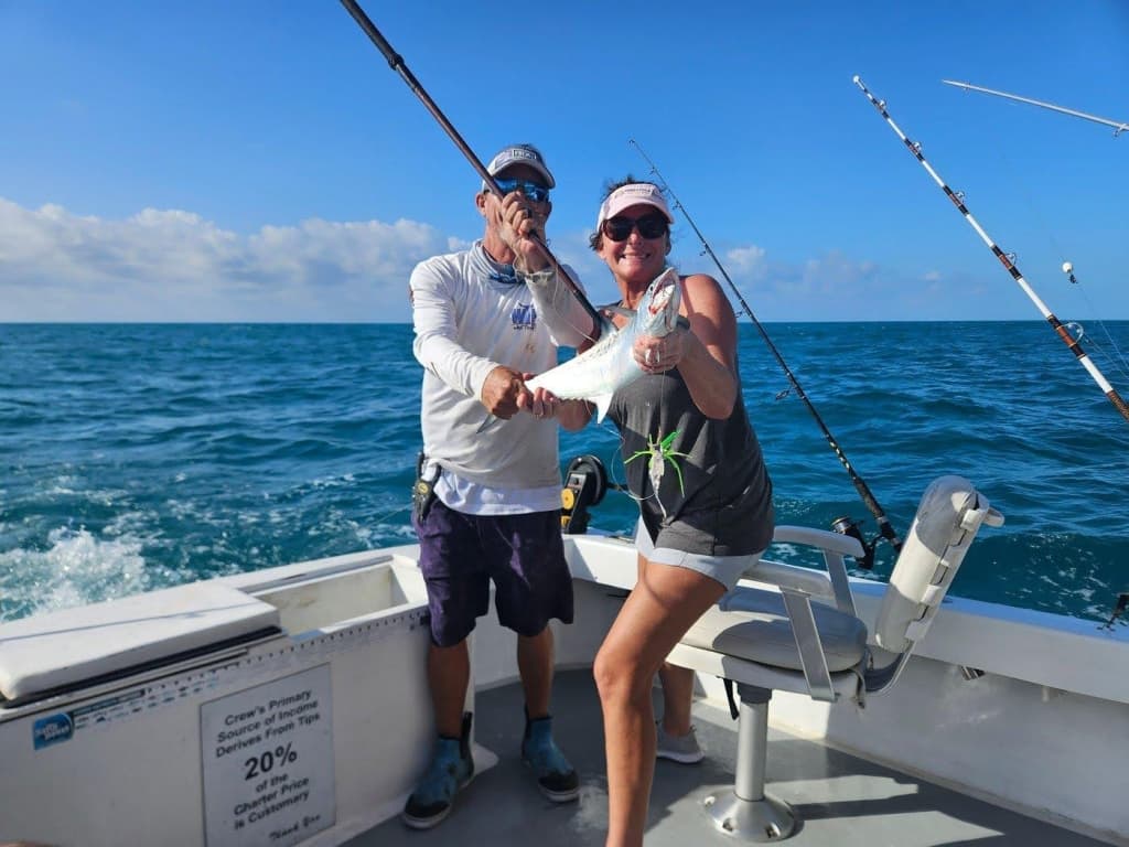 Woman holding a giant fish