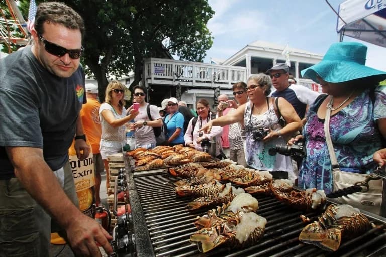 man grilling for event