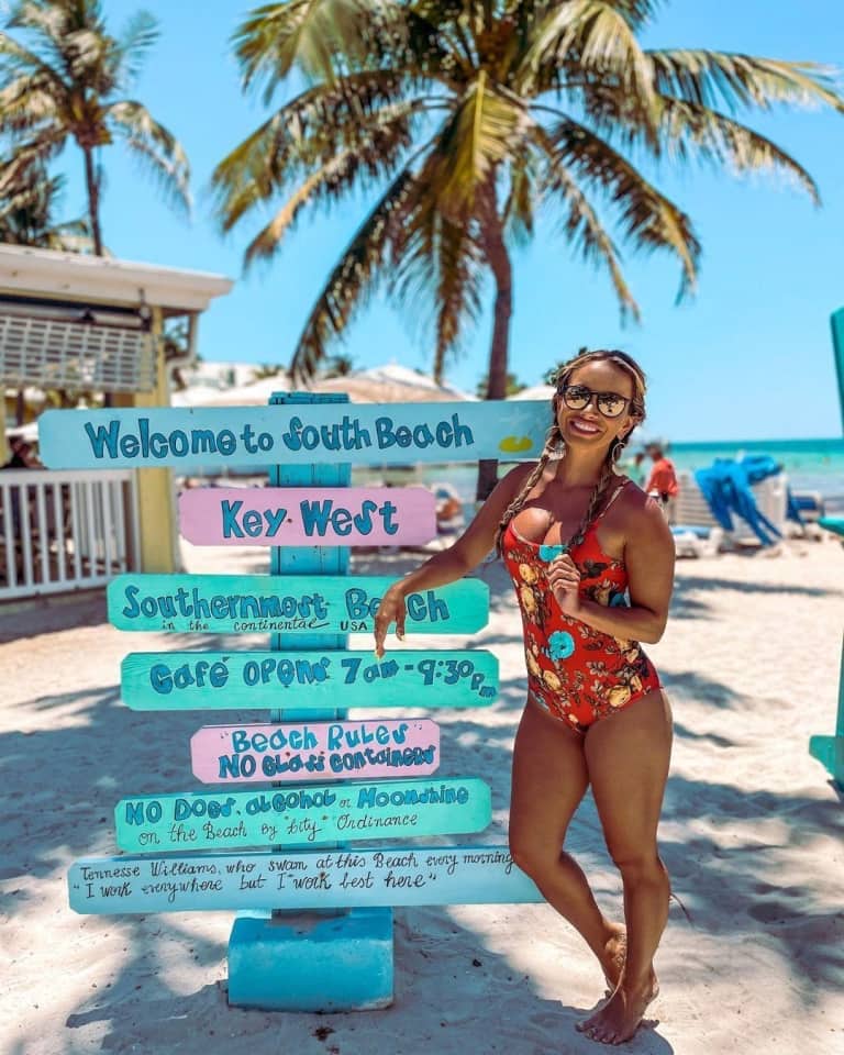 woman by sign post