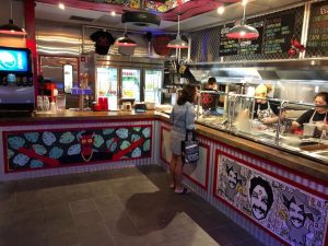 lady ordering food at counter