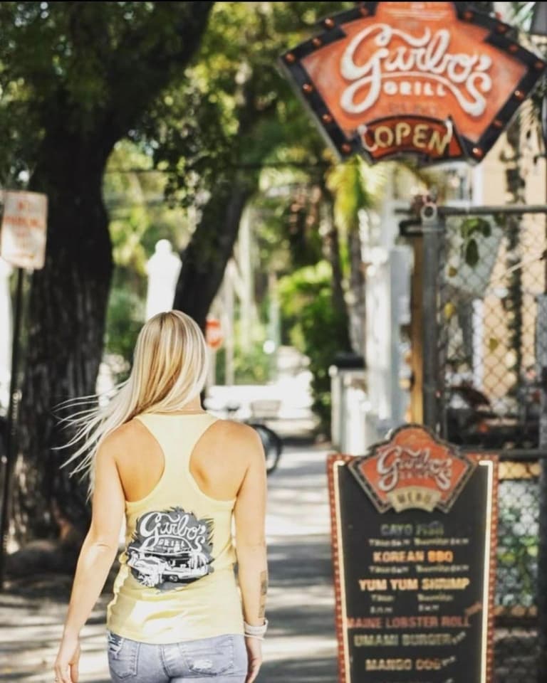 woman walking down the street to diner