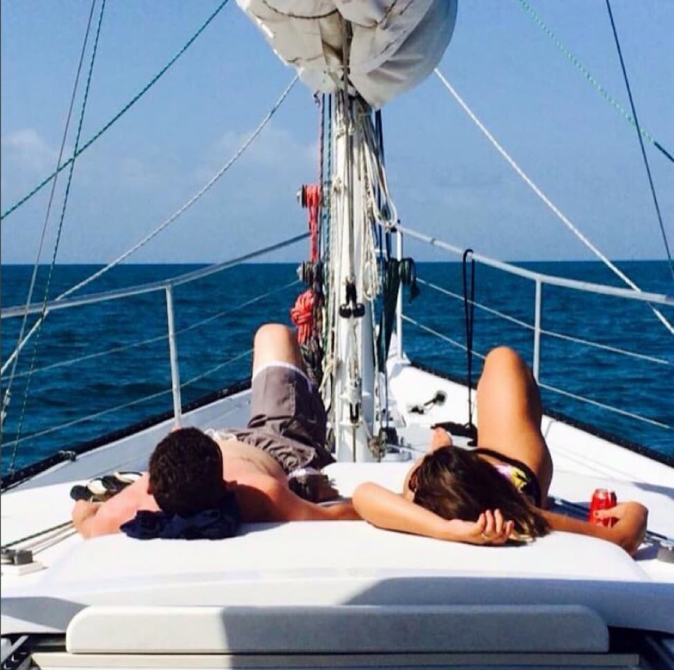 couple on sail boat