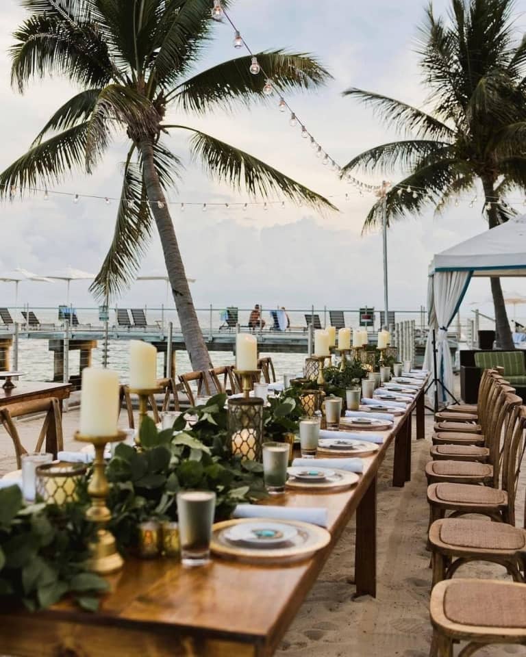 wedding tables setup by beach