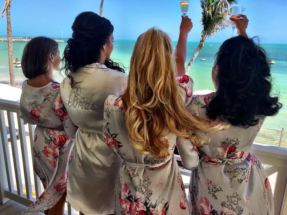 bridesmaids on balcony