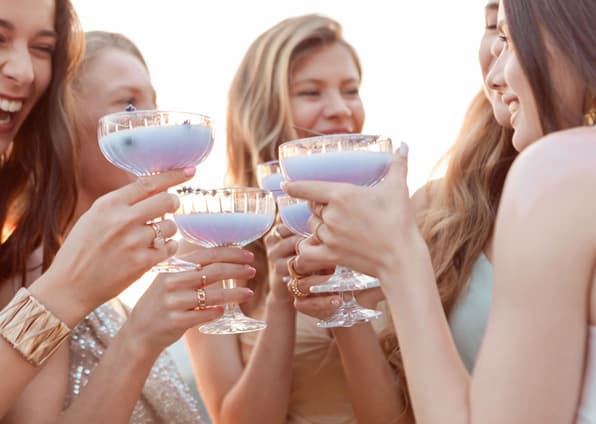 A group of women sharing a toast